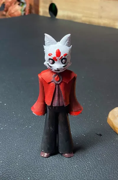 The same cat-masked character as a hand-painted 3D printed figure